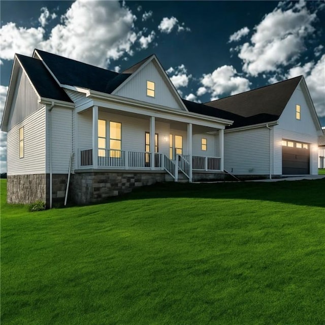 491 Shannon Dr, Mount Pleasant Twp Wml, PA 15666 - modern farmhouse with a porch, a front yard, and a garage