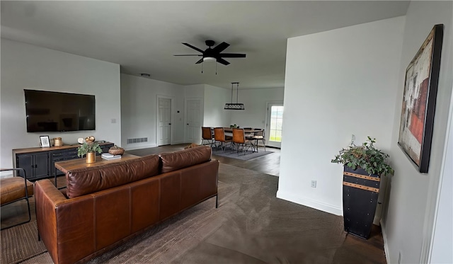 491 Shannon Dr, Mount Pleasant Twp Wml, PA 15666 - living room featuring ceiling fan and baseboards