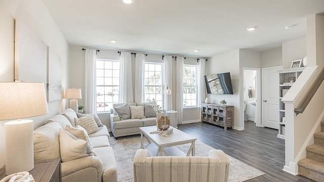 living room with dark wood-type flooring