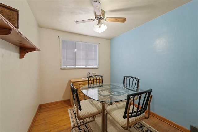 dining area featuring ceiling fan and light hardwood / wood-style floors