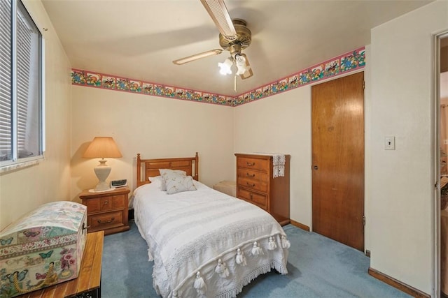 bedroom with ceiling fan, a closet, and carpet