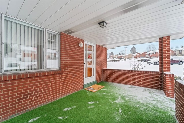 view of snow covered patio