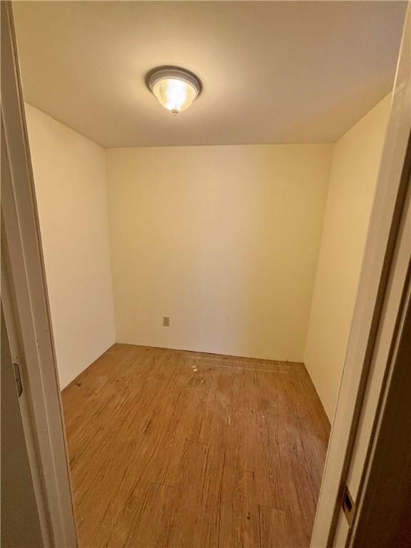 spare room with light wood-type flooring