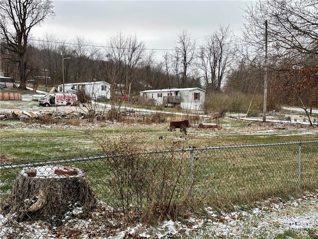 view of yard covered in snow