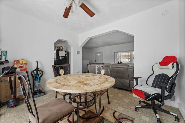 dining room featuring ceiling fan