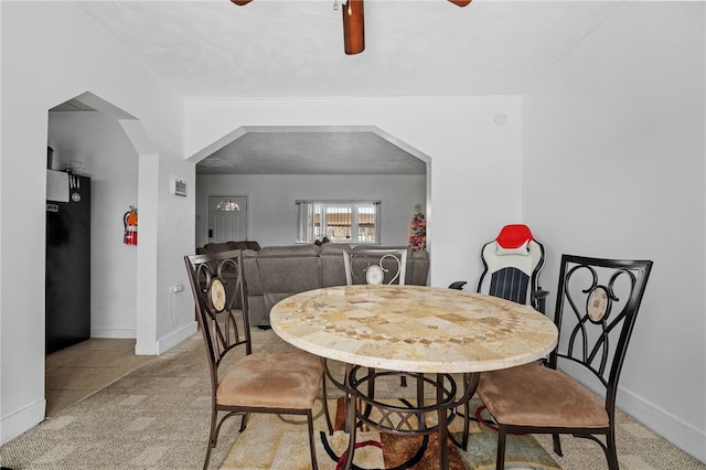 view of carpeted dining area