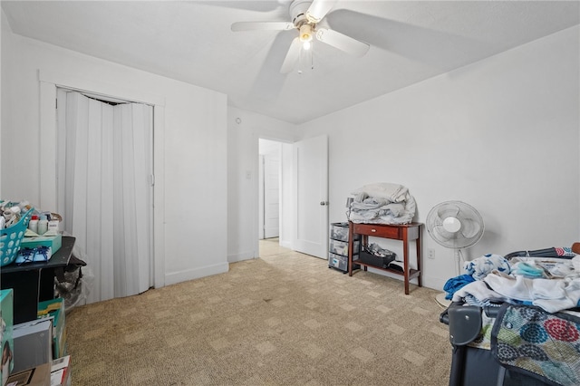 bedroom with ceiling fan and light colored carpet