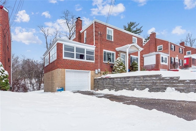 front of property featuring a garage