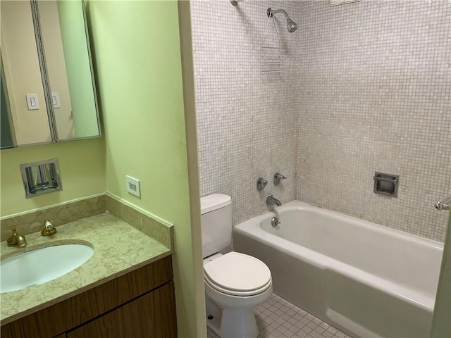 full bathroom featuring tub / shower combination, tile patterned floors, vanity, and toilet