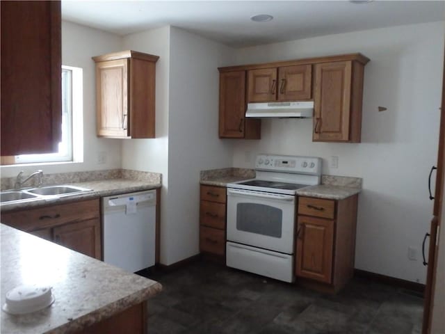 kitchen featuring sink and white appliances