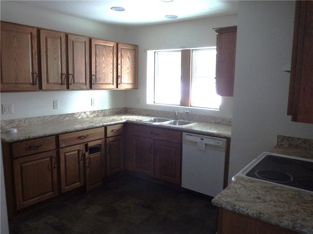 kitchen with sink, range, and dishwasher