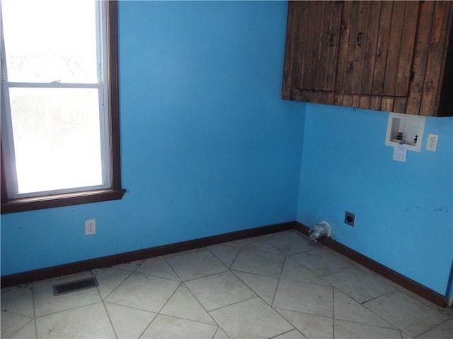 laundry area with washer hookup and electric dryer hookup