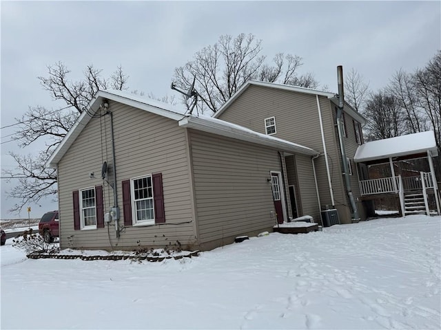 view of snow covered property