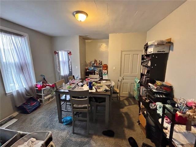 view of carpeted dining area