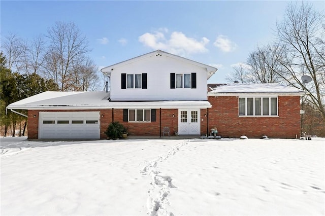 split level home with a garage