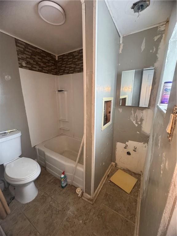 bathroom featuring toilet and tub / shower combination