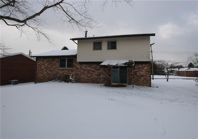 view of snow covered property