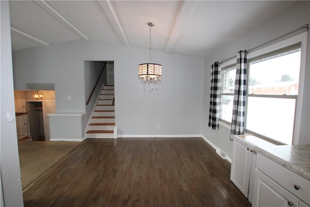 unfurnished dining area featuring dark hardwood / wood-style flooring, a chandelier, and vaulted ceiling with beams