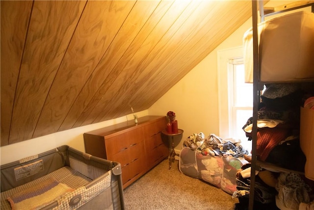 bonus room with lofted ceiling, light carpet, and wood ceiling