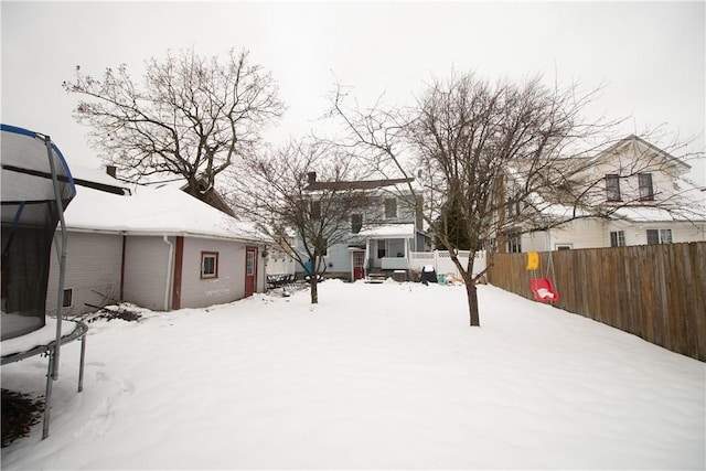 view of yard covered in snow