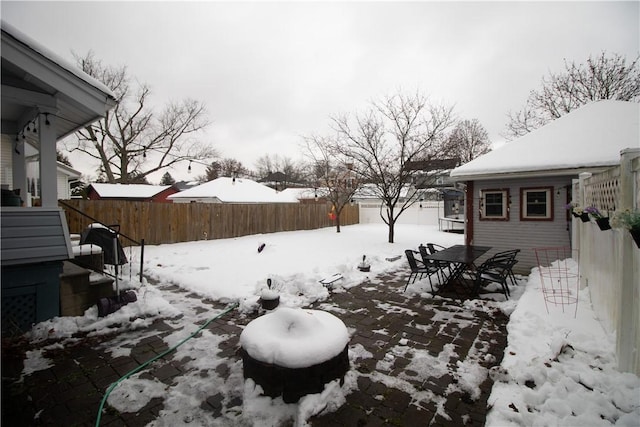 view of yard covered in snow