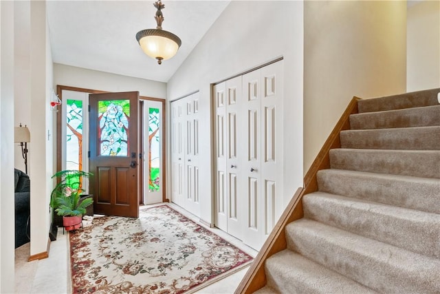 entryway with lofted ceiling