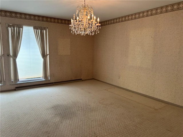 carpeted empty room featuring a baseboard heating unit, a healthy amount of sunlight, and an inviting chandelier