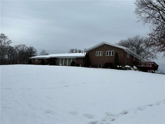 view of snow covered property