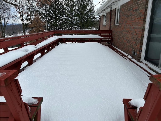 view of snow covered deck