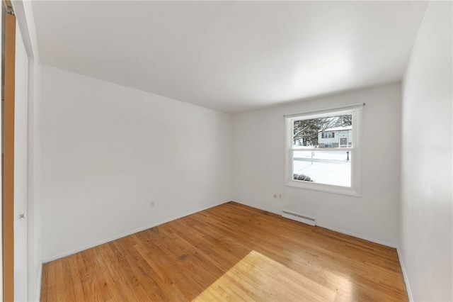 spare room with light wood-type flooring