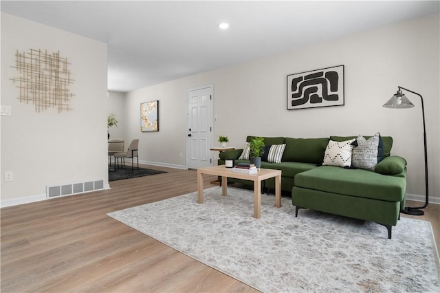 living room with hardwood / wood-style floors