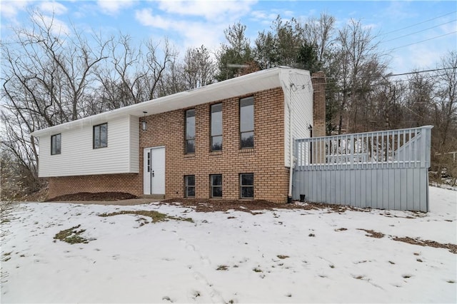 view of snow covered property