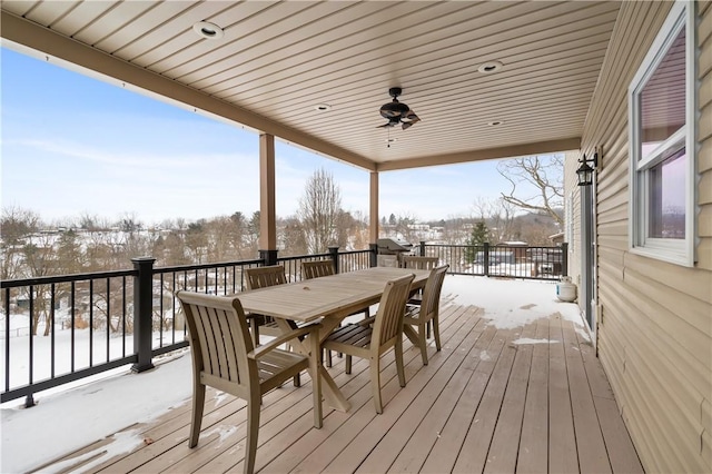 snow covered deck with ceiling fan