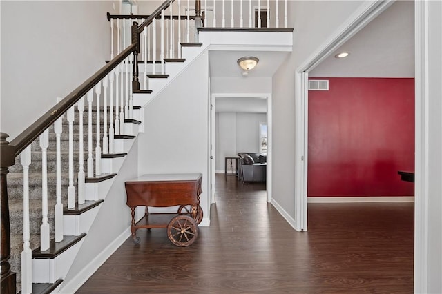 foyer featuring dark hardwood / wood-style floors