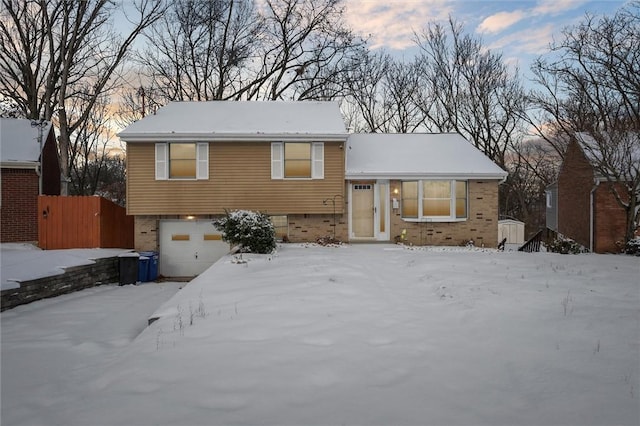 split level home featuring a garage