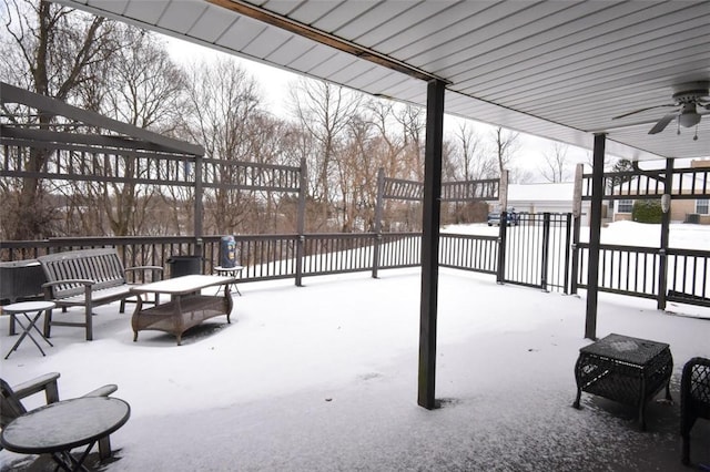 snow covered patio with ceiling fan