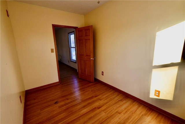 empty room featuring hardwood / wood-style floors