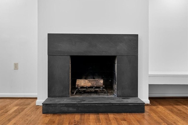 interior details featuring hardwood / wood-style floors