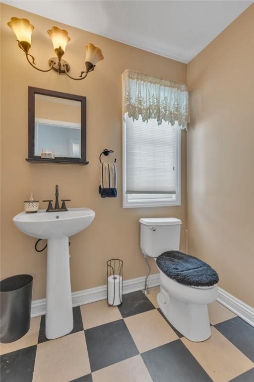 bathroom featuring toilet