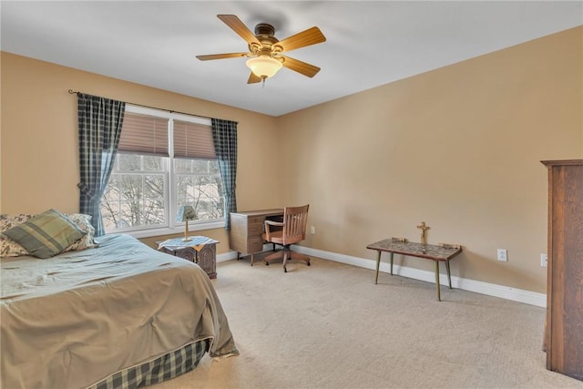 bedroom with light carpet and ceiling fan