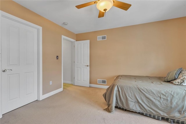 carpeted bedroom featuring ceiling fan