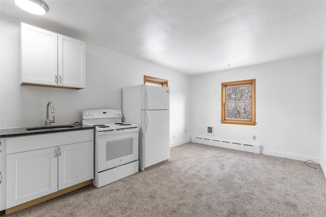 kitchen featuring baseboard heating, white appliances, white cabinetry, sink, and light colored carpet