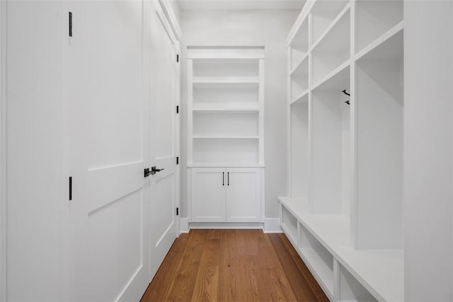 mudroom with light hardwood / wood-style flooring