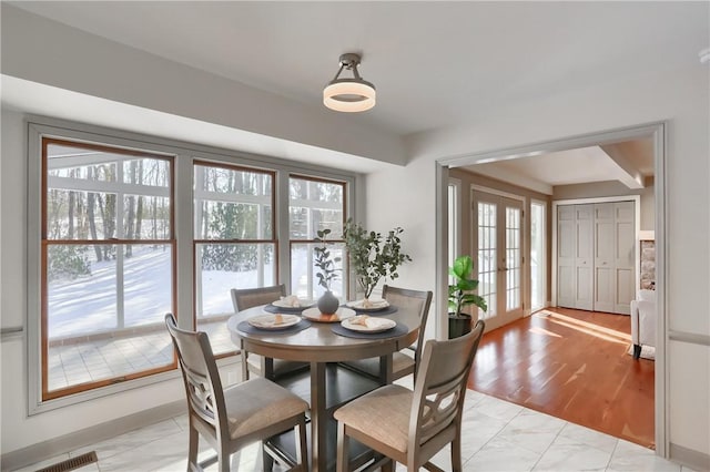 dining area featuring french doors