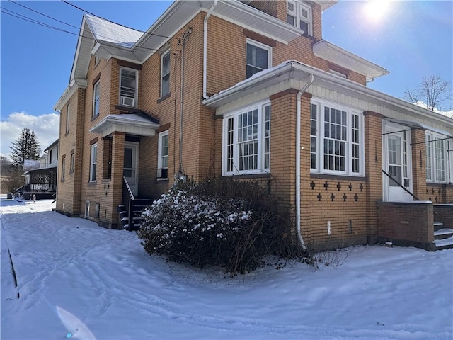 view of snow covered property