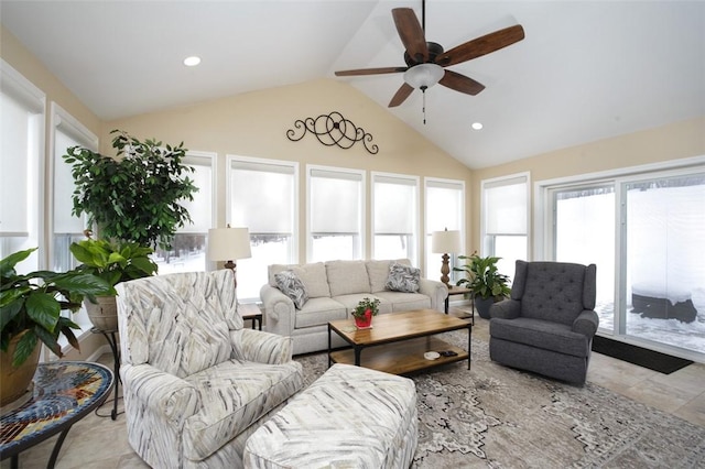 sunroom featuring lofted ceiling, plenty of natural light, and ceiling fan