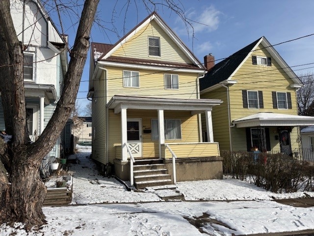 front facade with a porch