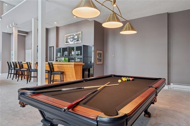 rec room featuring light carpet, billiards, and bar