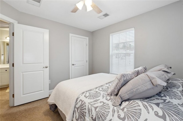 carpeted bedroom with ceiling fan