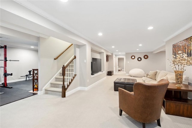 carpeted living room with crown molding